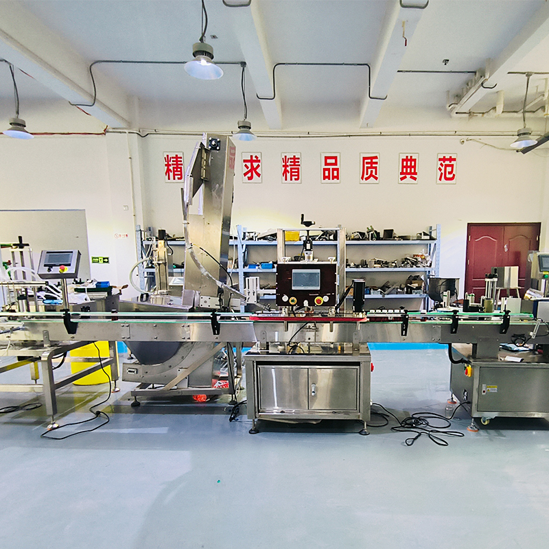 長沙直線式夾蓋機(jī)-整套灌裝旋蓋機(jī)械